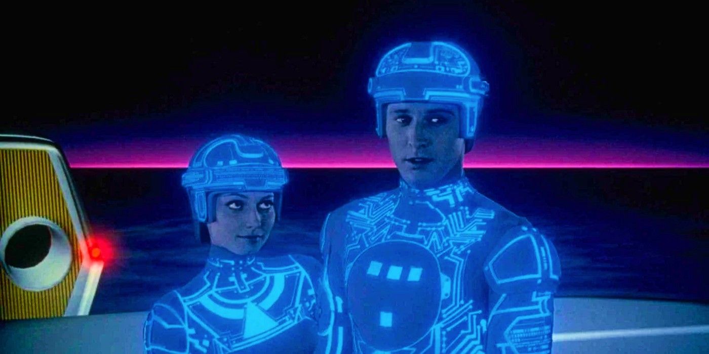 Bruce Boxleitner and Cindy Morgan standing next to each other in Tron