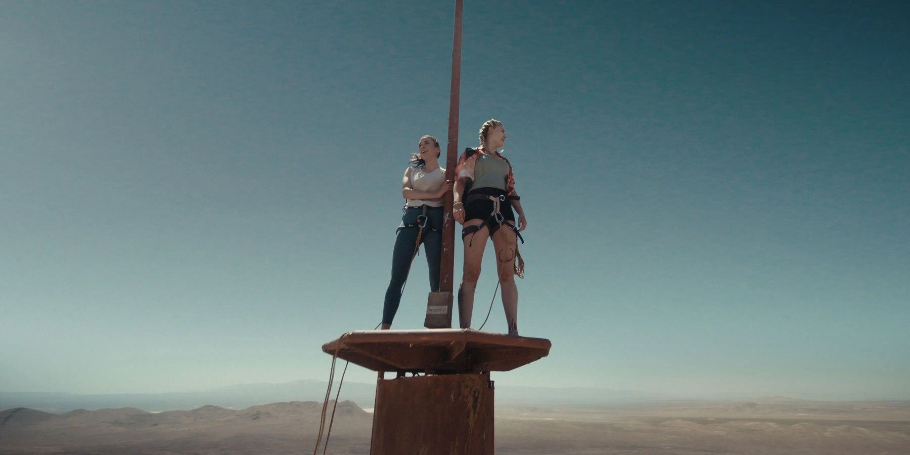 Two women on a TV tower in Fall