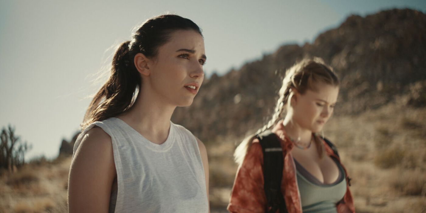 Two women standing together in Fall