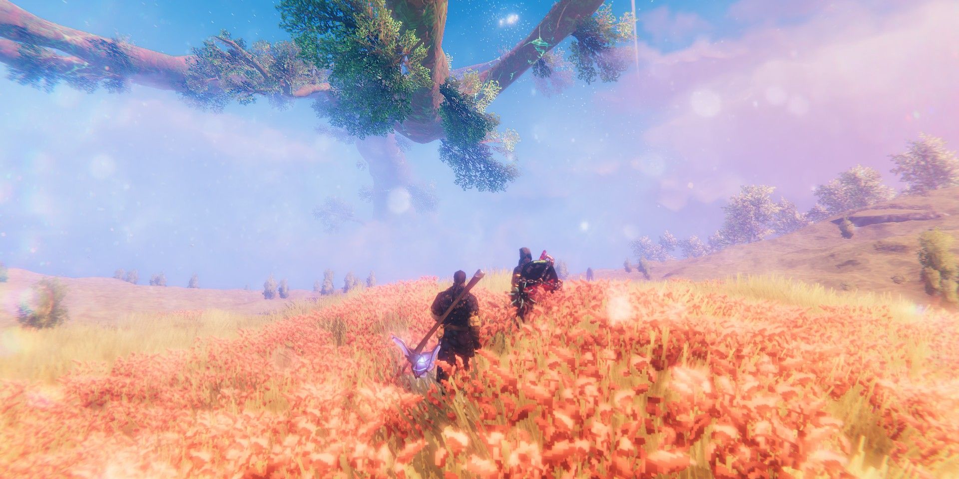 Screenshot of two players standing in Valheim's Plains biome with the world tree in the background.
