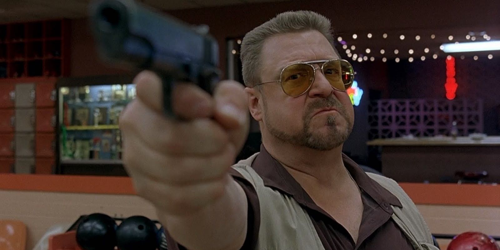 Walter with a gun in The Big Lebowski