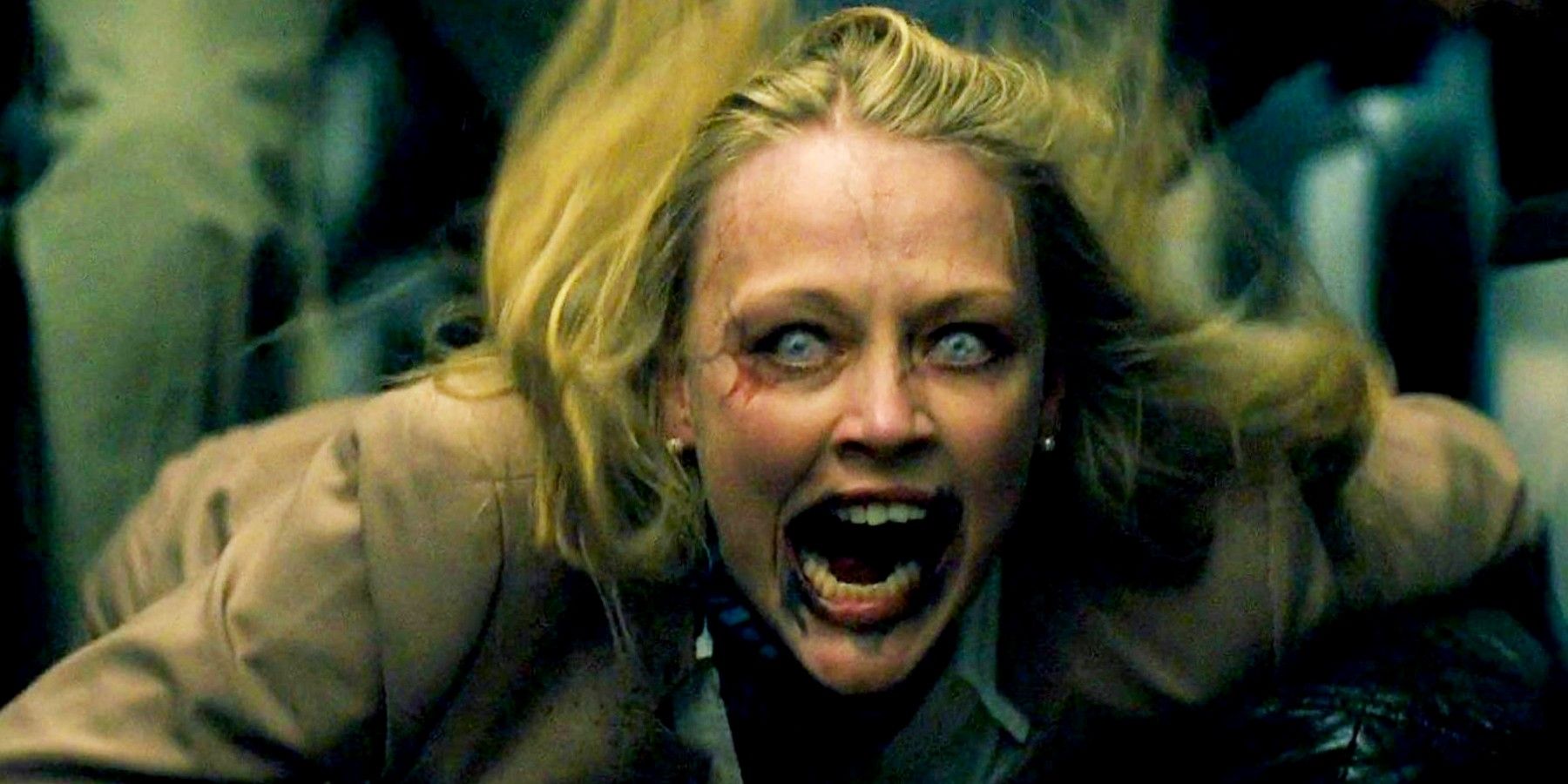 Woman zombie screaming with mouth wide open in World War Z