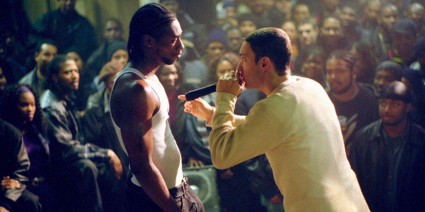 An image of Eminem singing into a microphone in 8 Mile