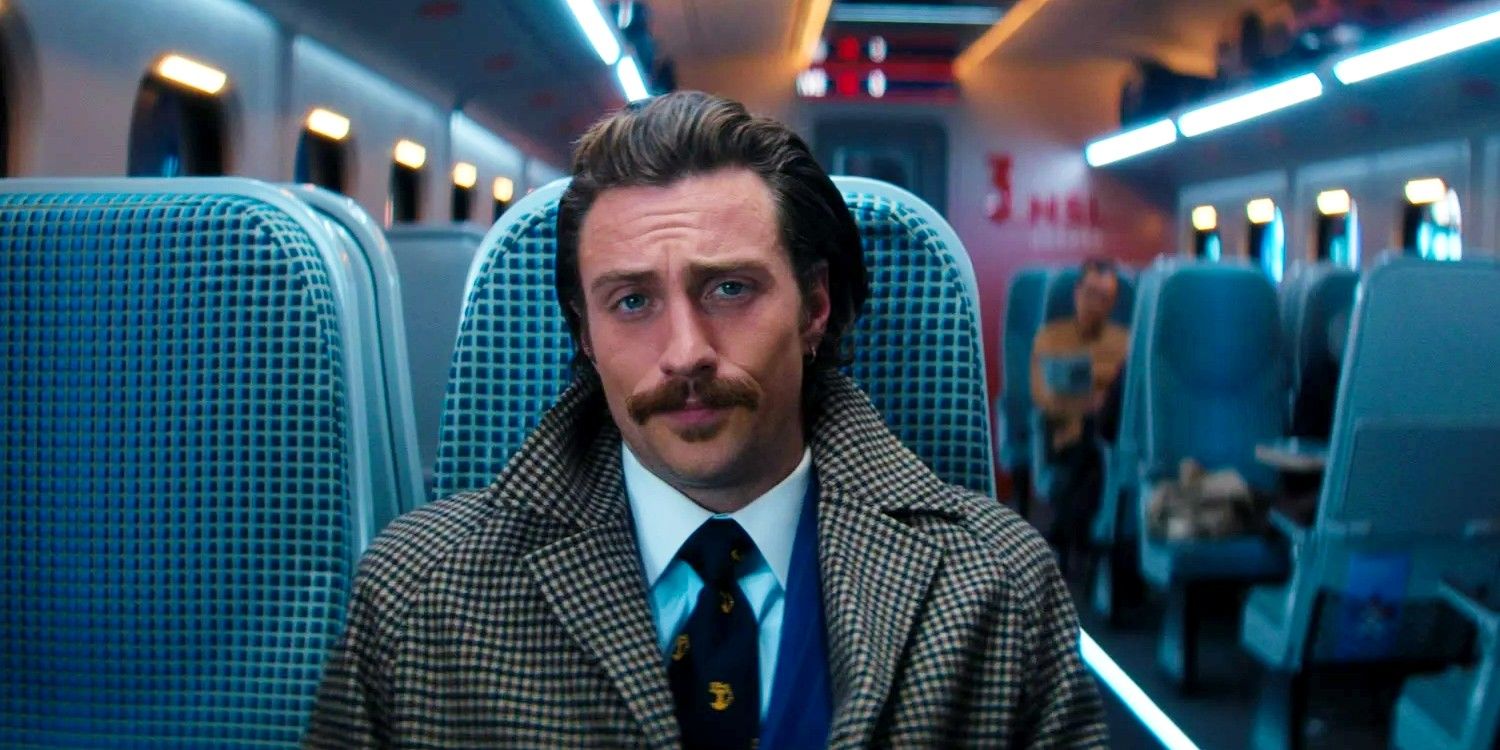 Aaron Taylor-Johnson sitting in a Bullet Train.