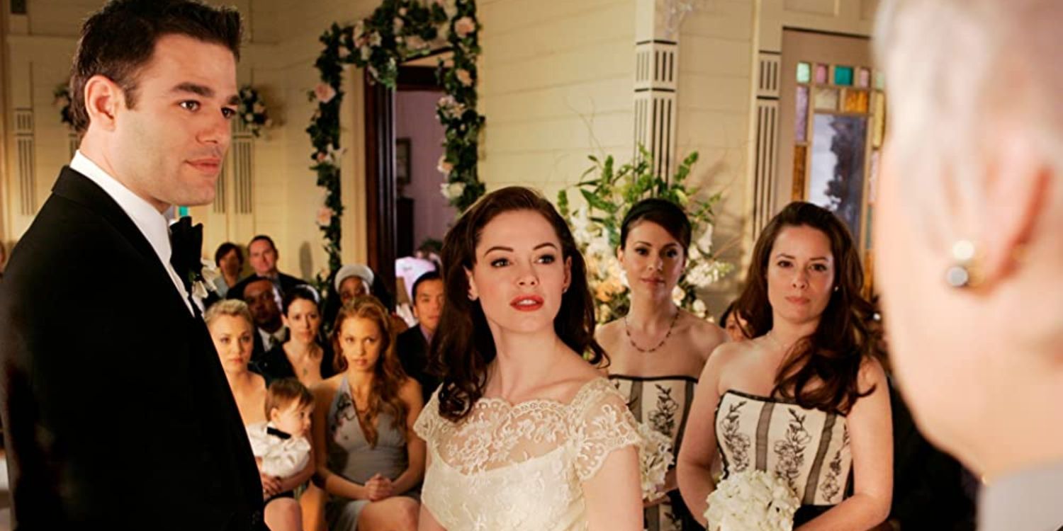 An image of Paige and Henry getting married in Charmed