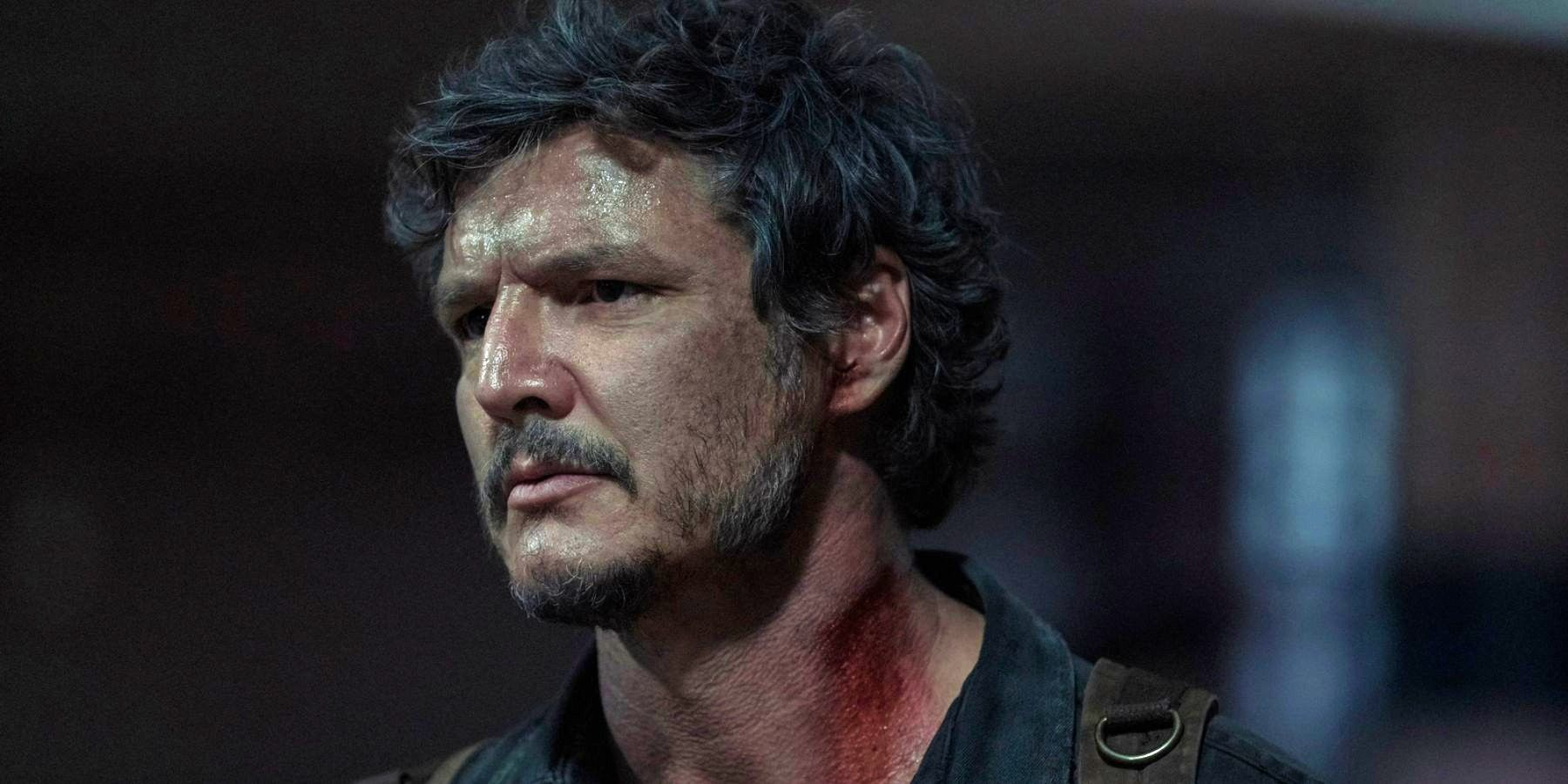 An injured Joel looking serious in The Last of Us finale