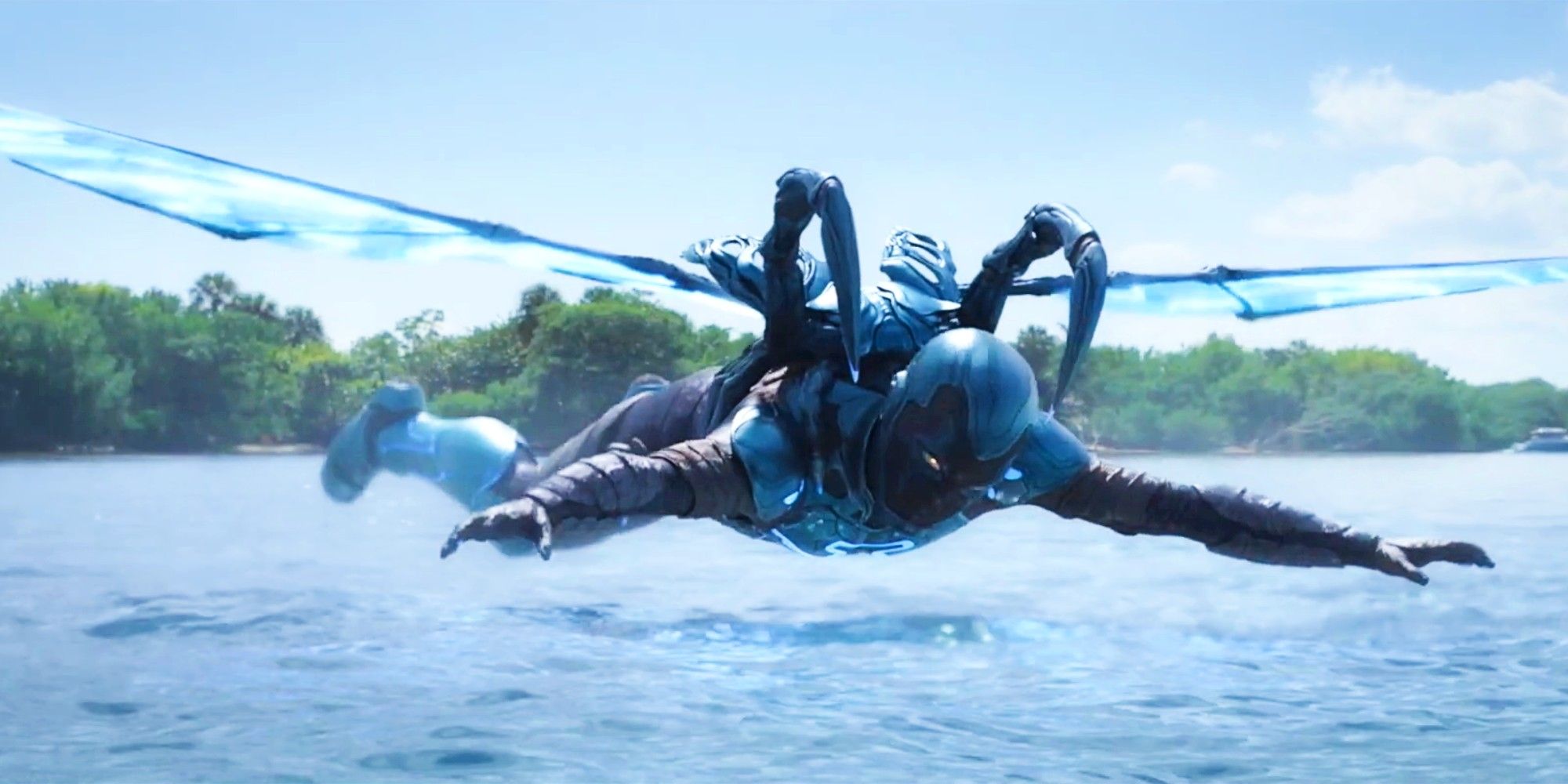 Blue Beetle hovering over water in trailer