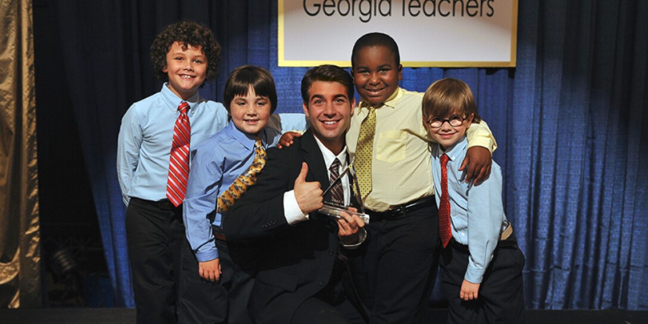 Brad Cohen and his students with an award in Front Of The Class on Hallmark