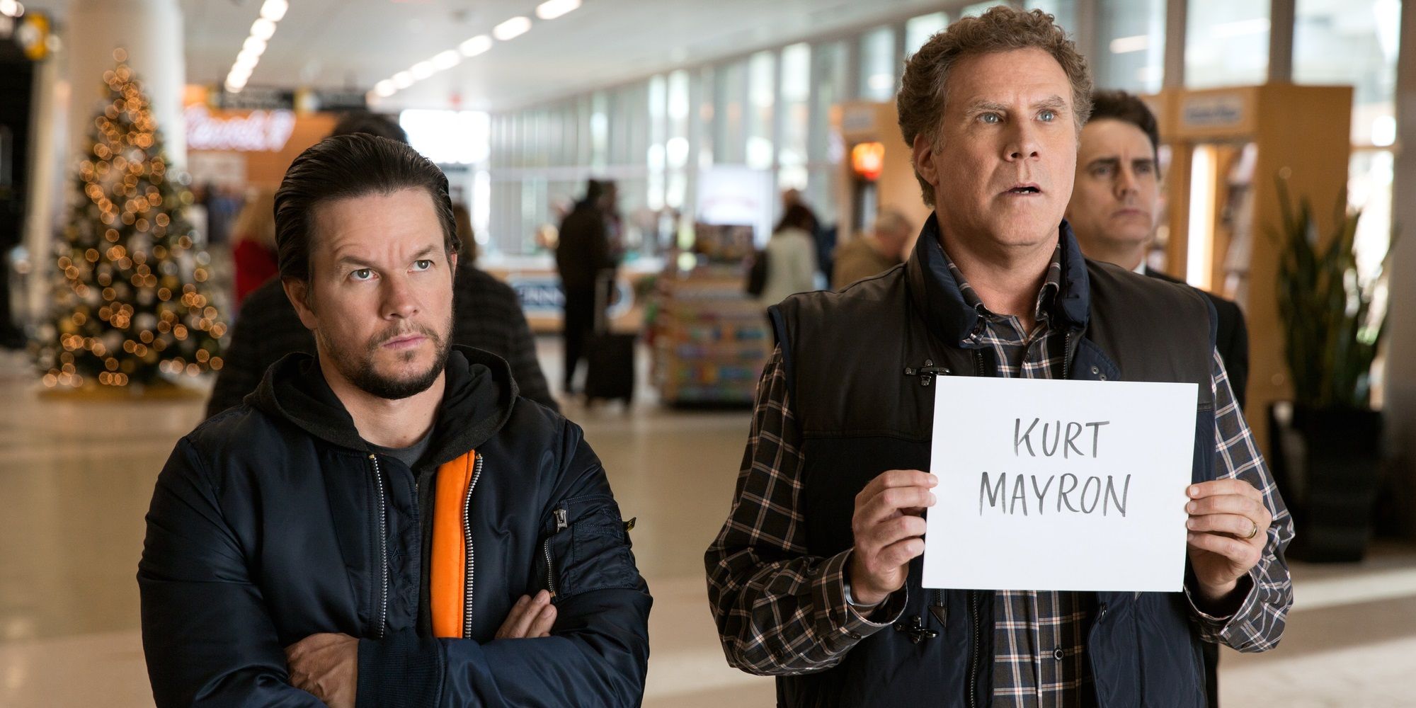 Brad and Dusty at an airport in Daddy's Home 2