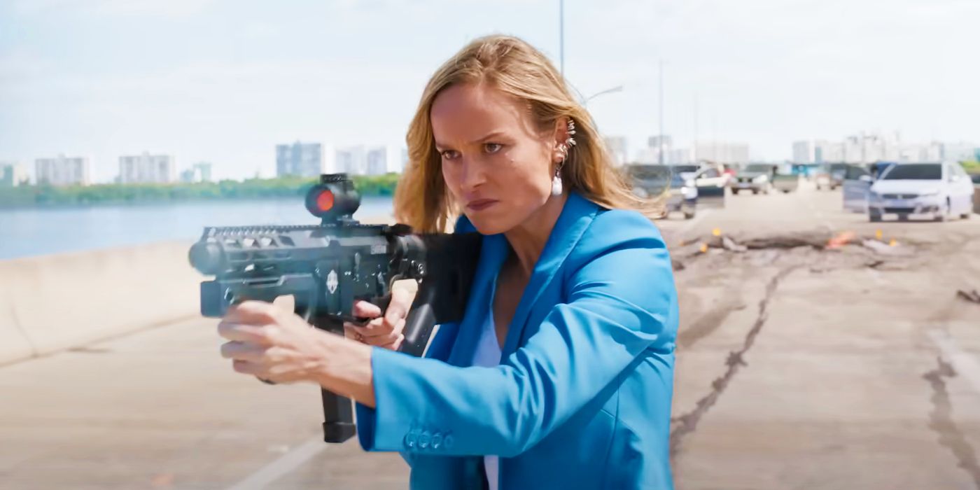 Brie Larson as Tess firing a gun in Fast X