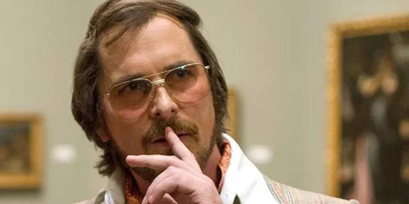 Christian Bale looking sideways in American Hustle