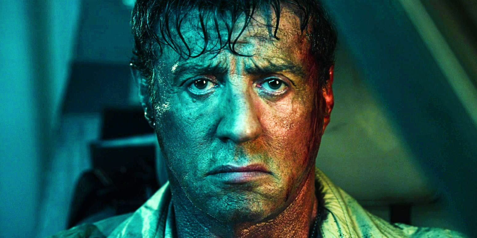 Close up of Sylvester Stallone as Barney Ross looking somber in The Expendables 3