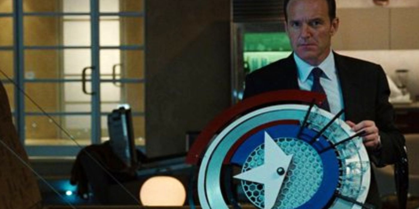 Coulson with Captain America's shield in Iron Man 2