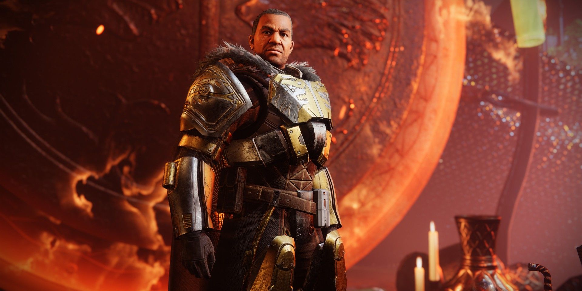 An in-game screenshot of Destiny 2&rsquo;s Lord Saladin looking toward the camera, while a giant flaming shield burns behind him.