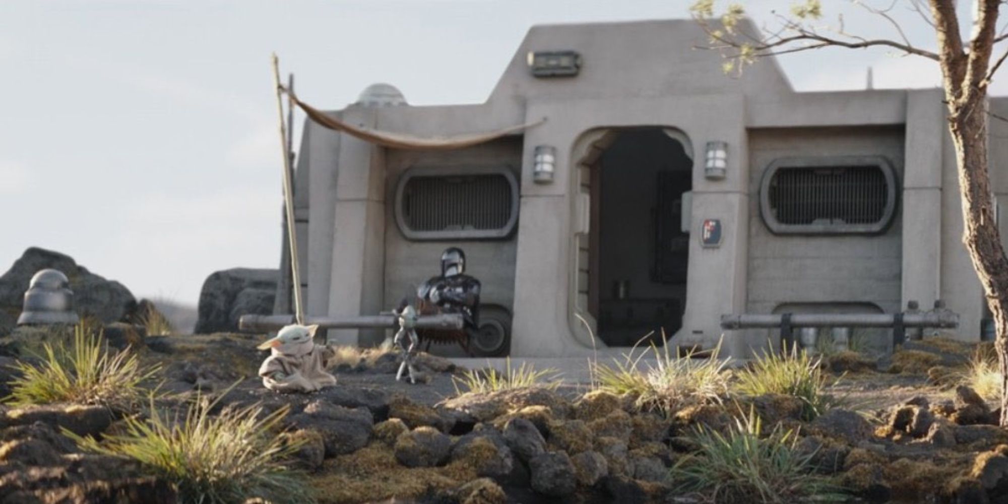 Din Grogu and Din Djarin at their cabin on Nevarro in The Mandalorian season 3 finale