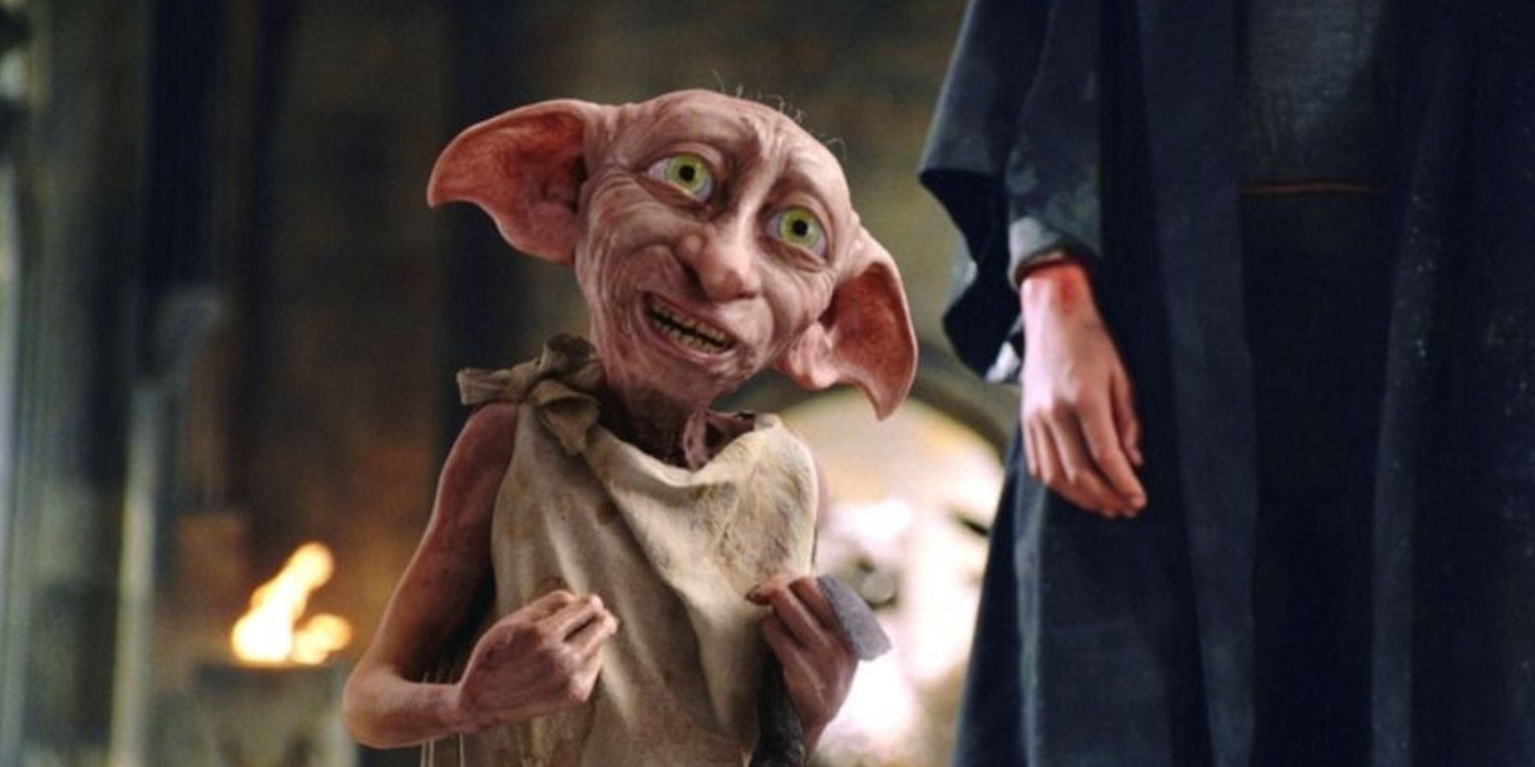 Dobby holding a sock at the end of Harry Potter and the Chamber of Secrets