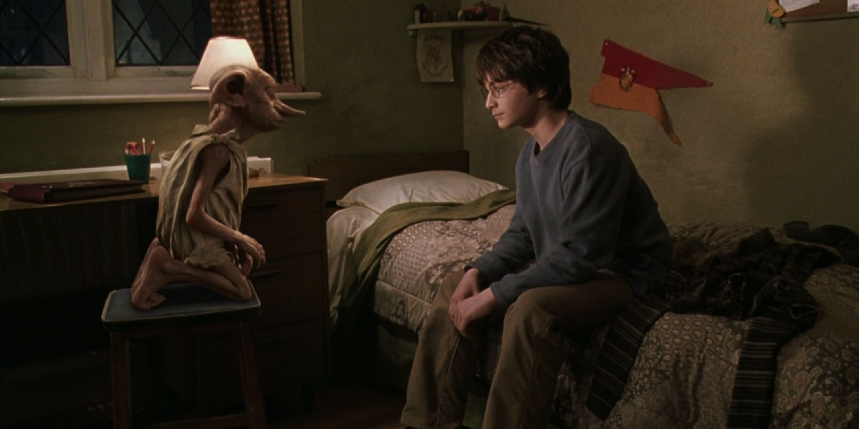 Dobby talking to Harry Potter in his bedroom in Chamber of Secrets