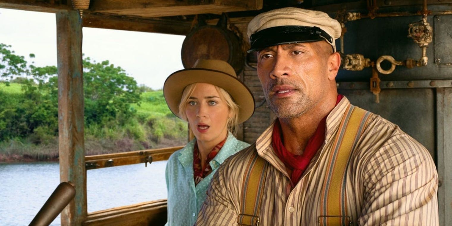 Dwayne Johnson and Emily Blunt on a boat in Jungle Cruise