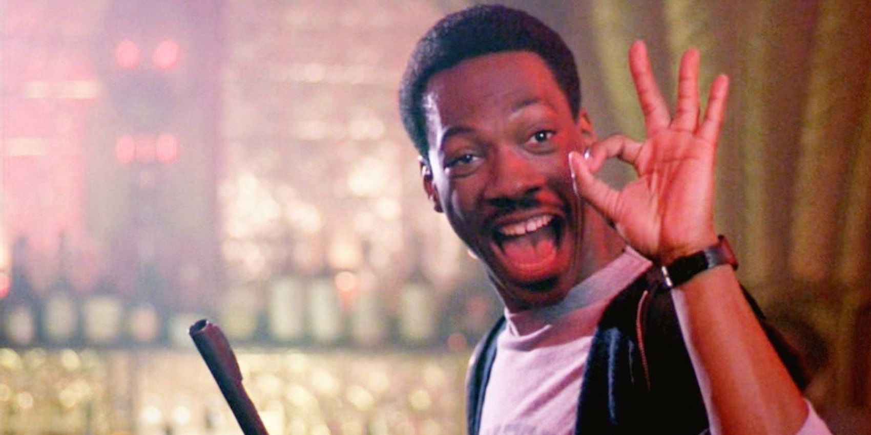 Eddie Murphy smiling in Beverly Hills Cop