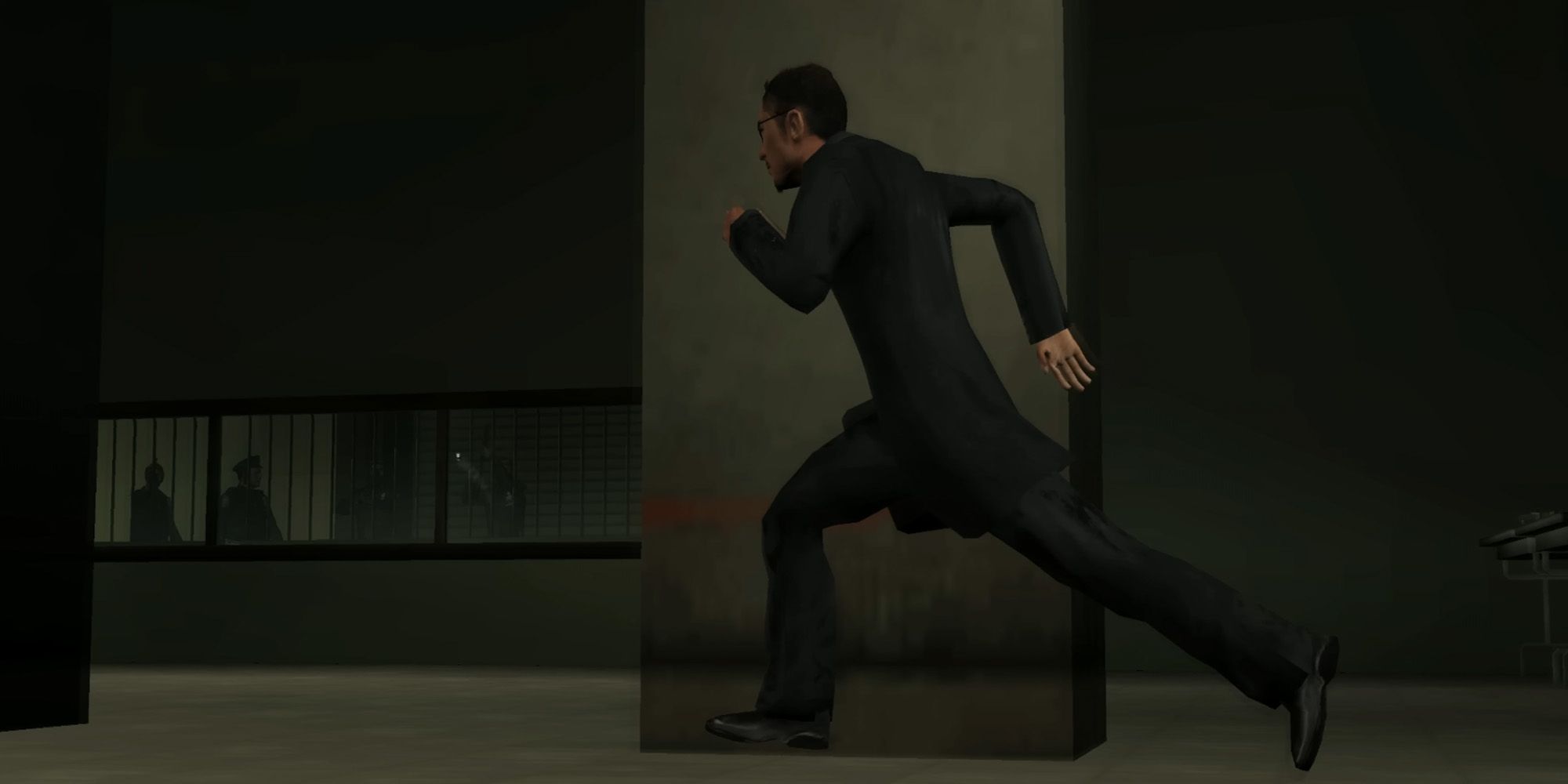 Enter The Matrix character Ghost running through a drab facility.