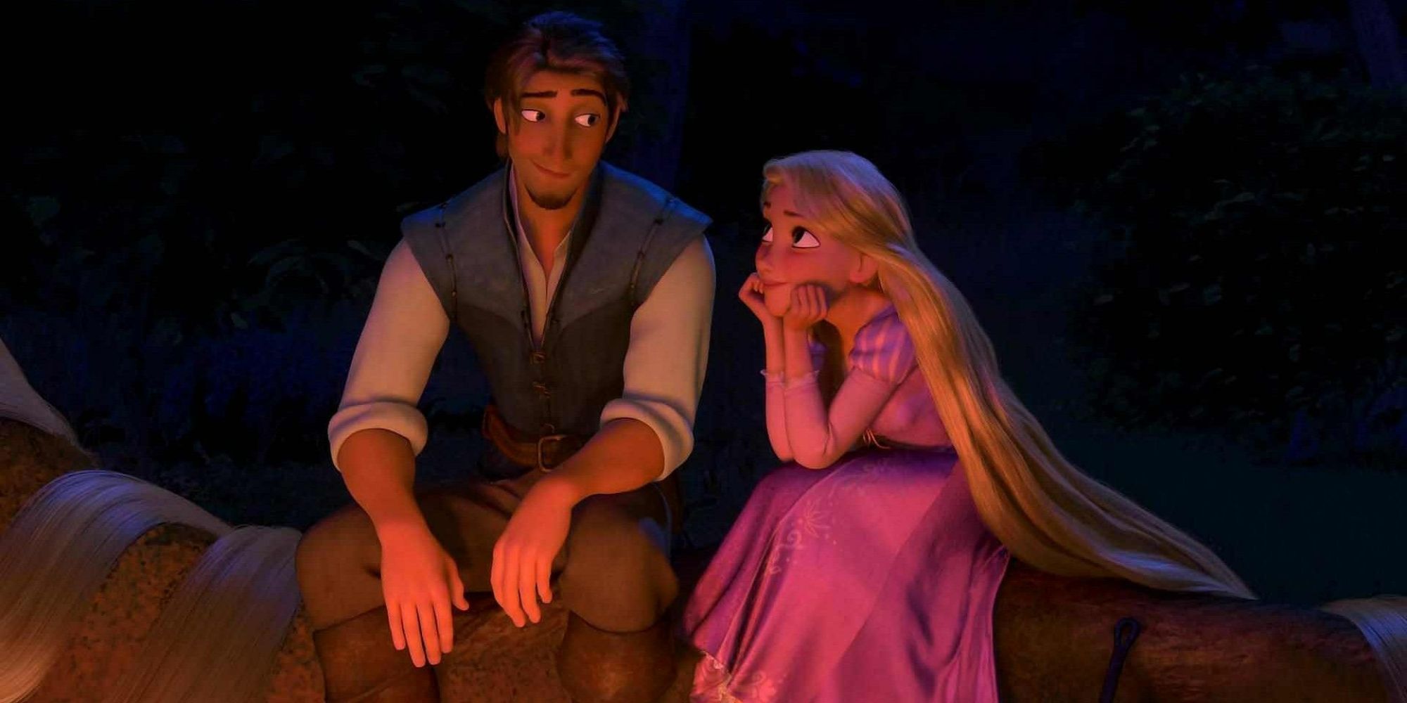 Flynn Rider and Rapunzel by the fire in Tangled