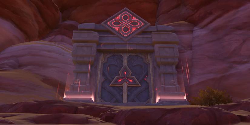 The locked doors of Genshin Impact's Molten Iron Fortress Domain. It glows with red lights, among stone walls in the desert.