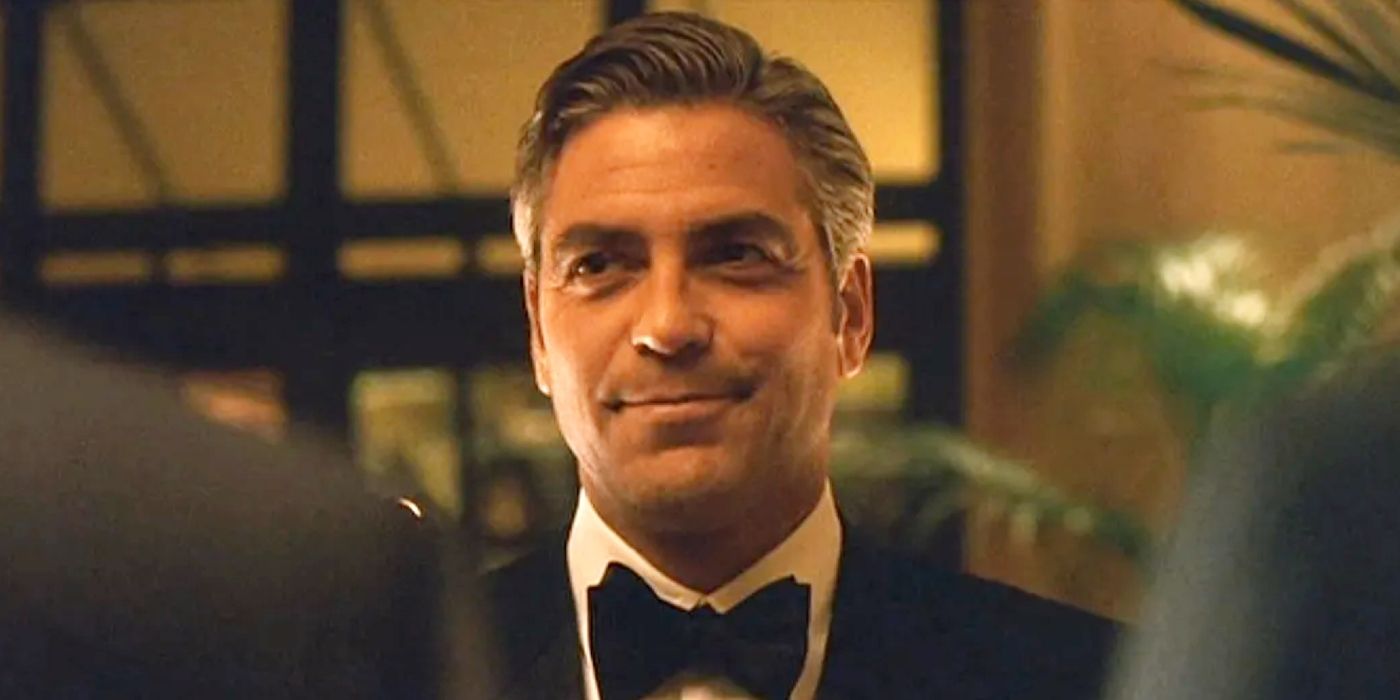 George Clooney smirking in Ocean's Eleven.
