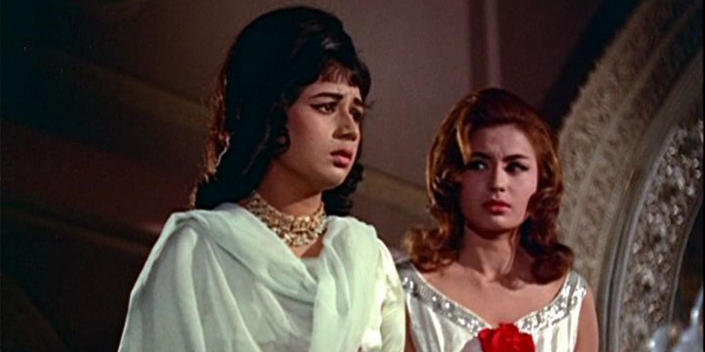 Two women appear fearful in the Hindi Agatha Christie adaptation Gumnaam