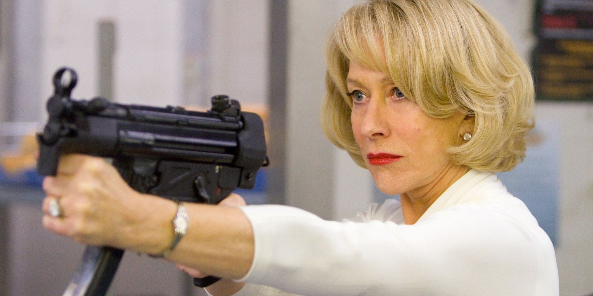 Helen Mirren with a machine gun in Red