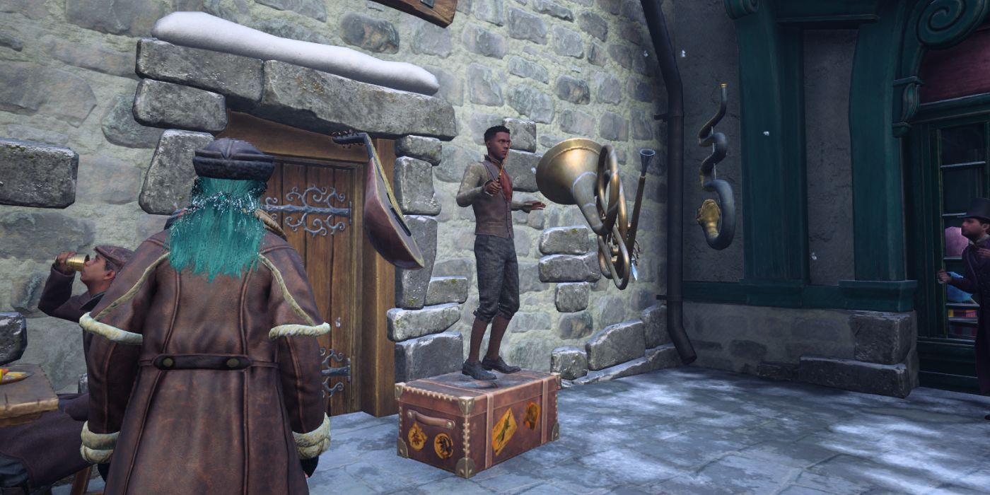 A musician in Hogsmeade conducting an small assortment of magical instuments in Hogwarts Legacy.