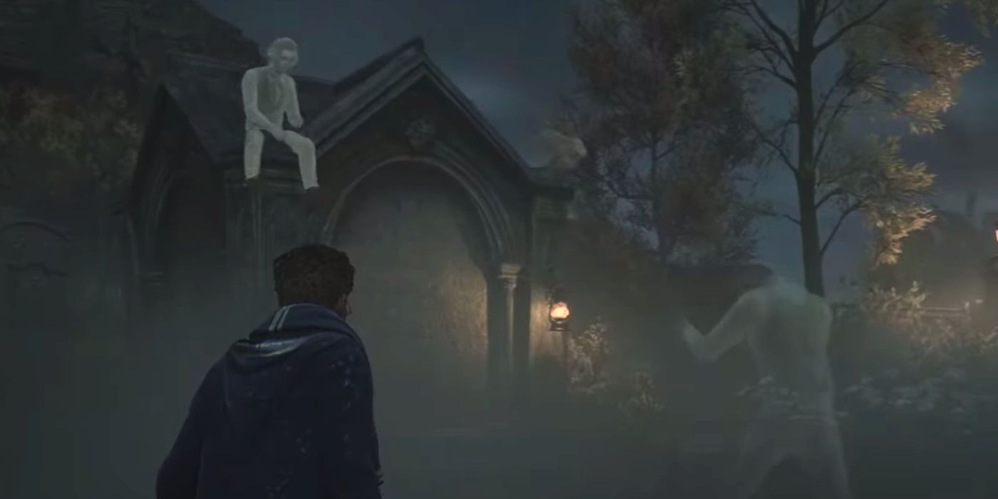 A decapitated ghost throwing his head to another ghost sitting atop a mausoleum in Hogwarts Legacy.