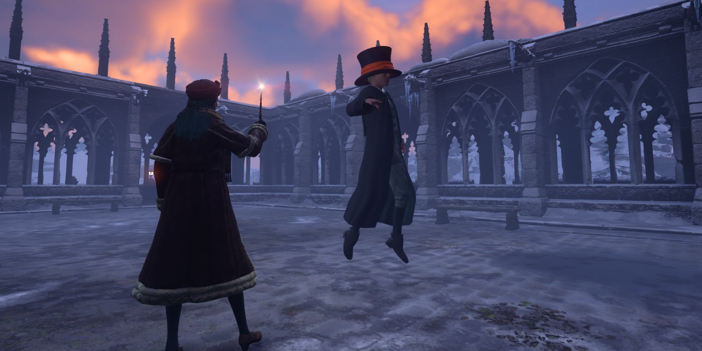 A student stuck levitating with a top hat over his head in Hogwarts Legacy.