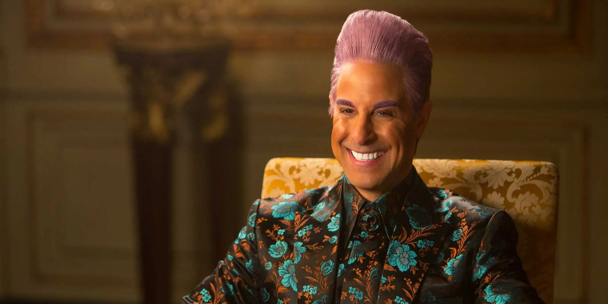 Stanley Tucci as Caesar Flickerman Smiling Wide from The Hunger Games