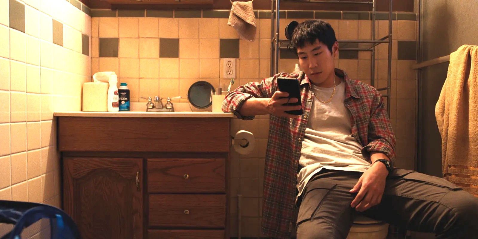 Young Mazino as Paul Cho Sitting on the Toilet in Beef