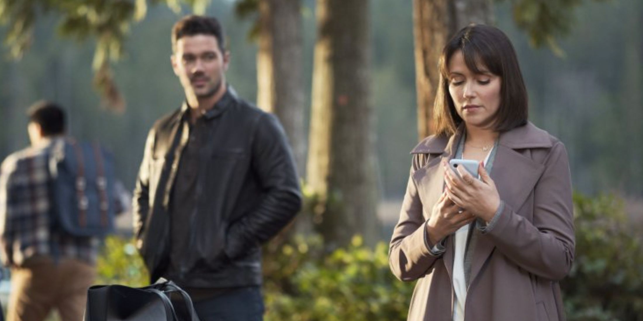 Italia Ricci and Ryan Paevey in a still from Hallmark's Don't Go Breaking My Heart