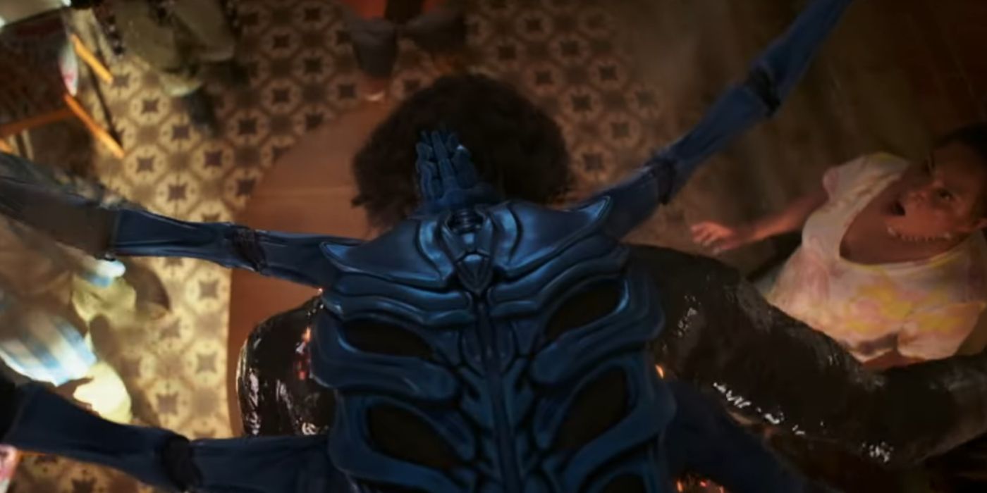 Jaime transforms into Blue Beetle