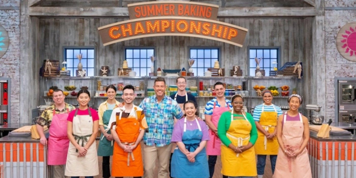 Jesse Palmer and the Summer Baking Championship contestants are smiling