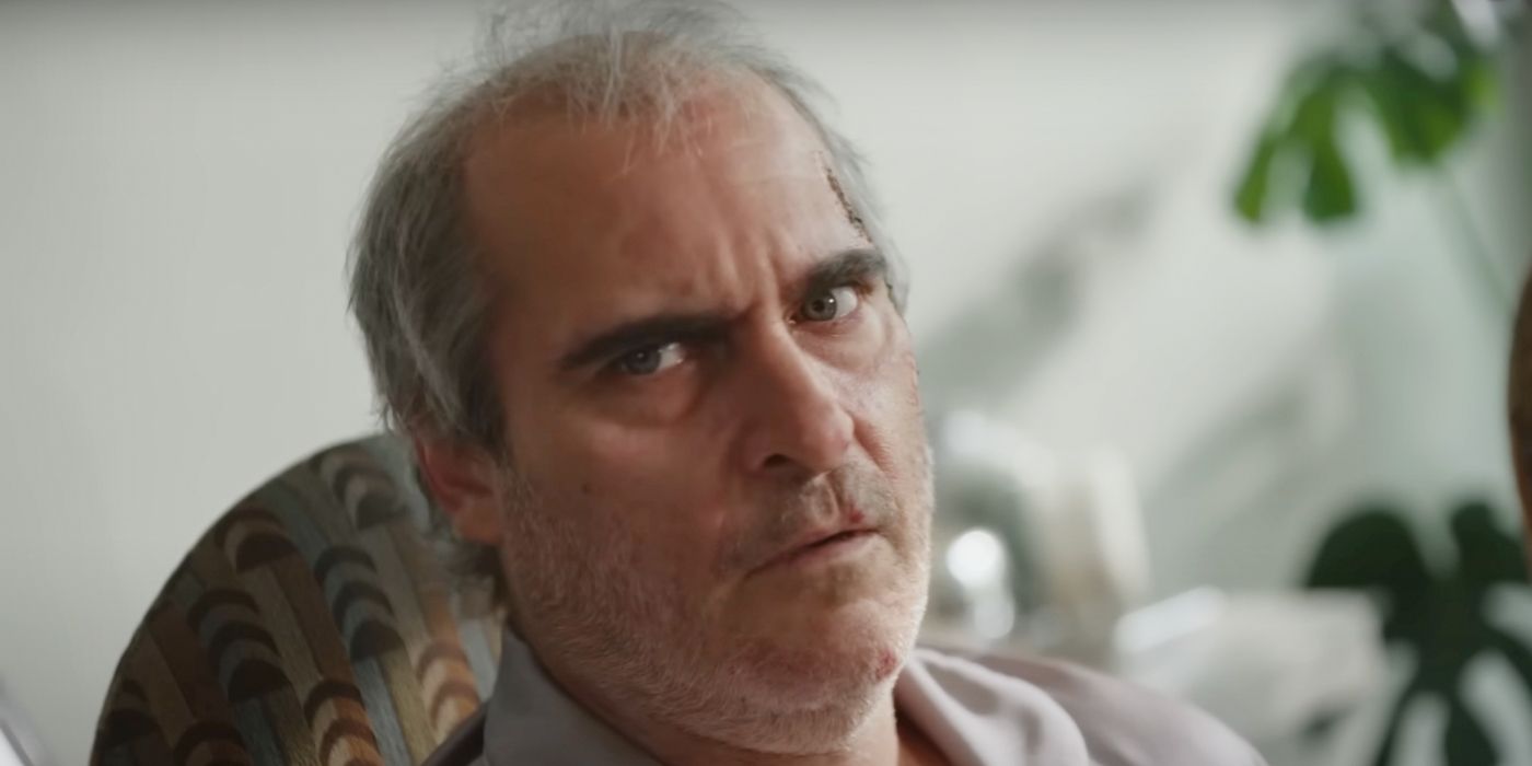 Joaquin Phoenix looking to the left in Beau Is Afraid