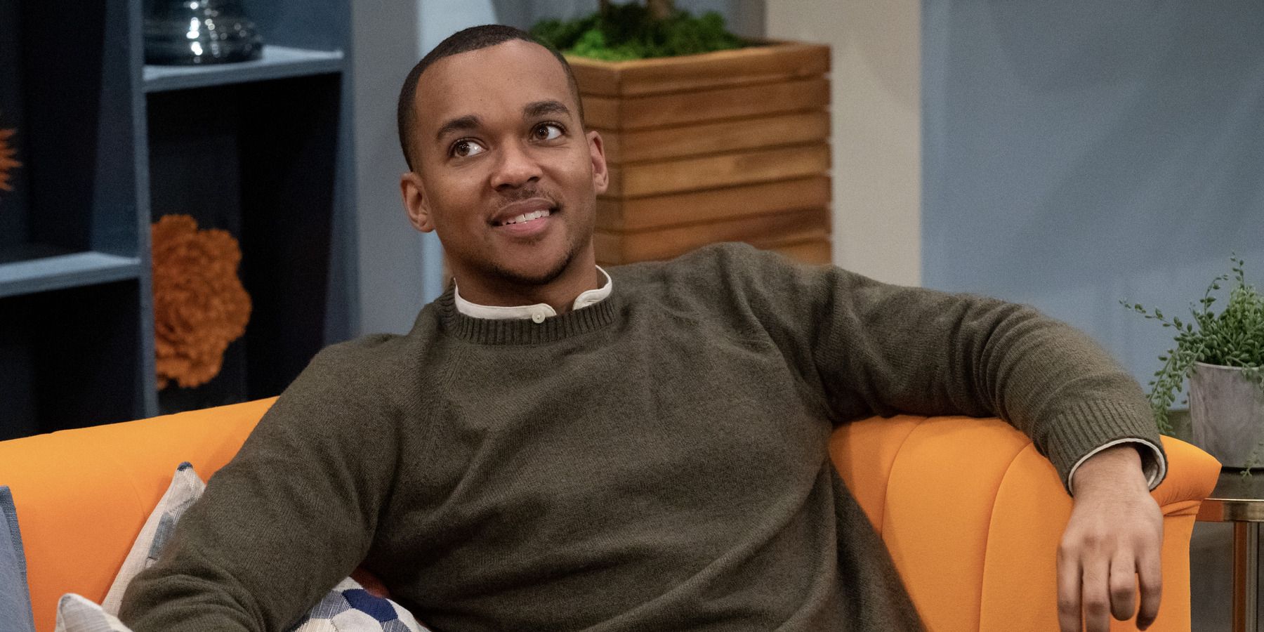 Love is Blind season 4 star Marshall Glaze smiling in a sweater