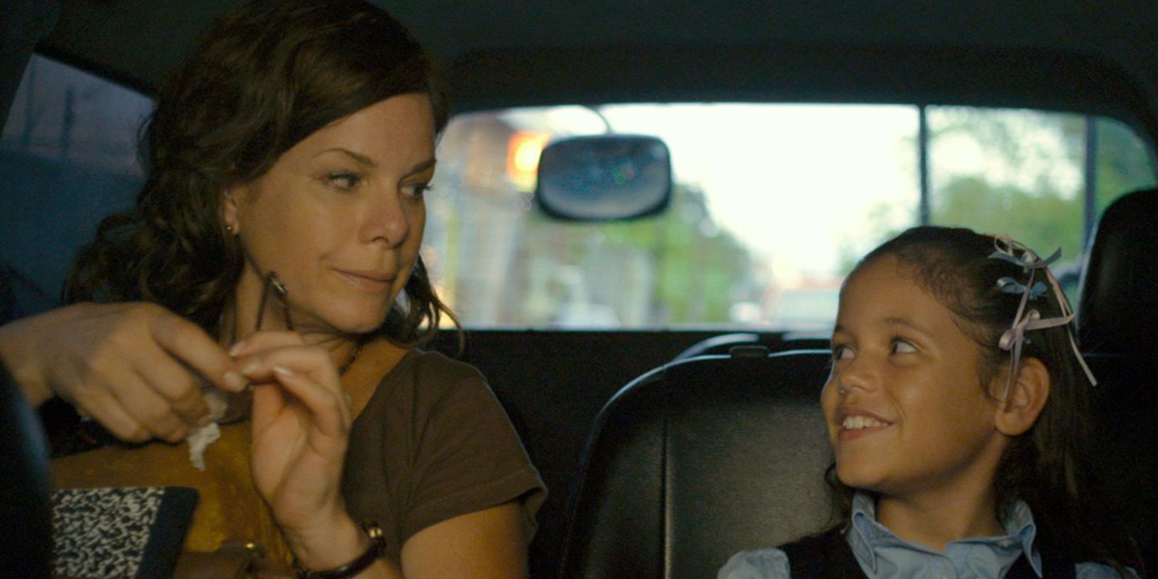 Marcia Gay Harden and Jenna Ortega in a car in After Words