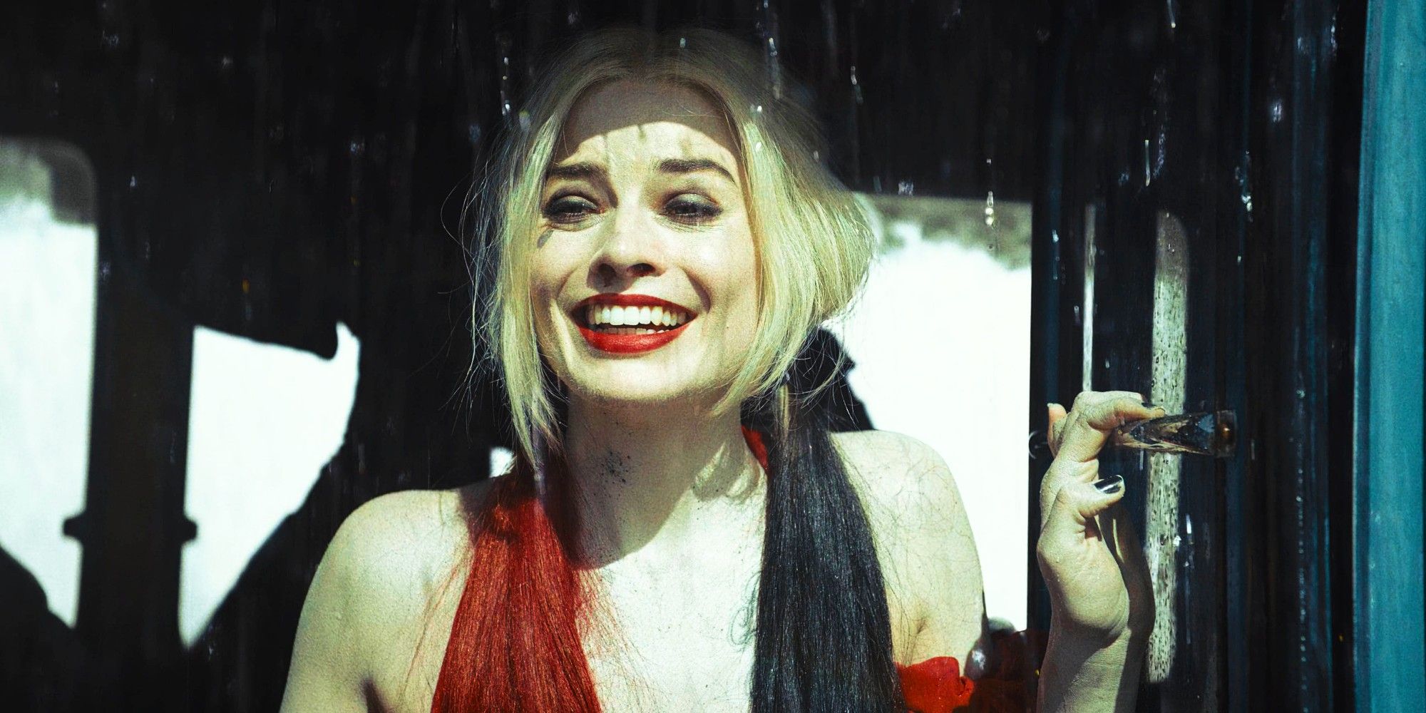 Margot Robbie As Harley Quinn Smiling In The Rain In The Suicide Squad