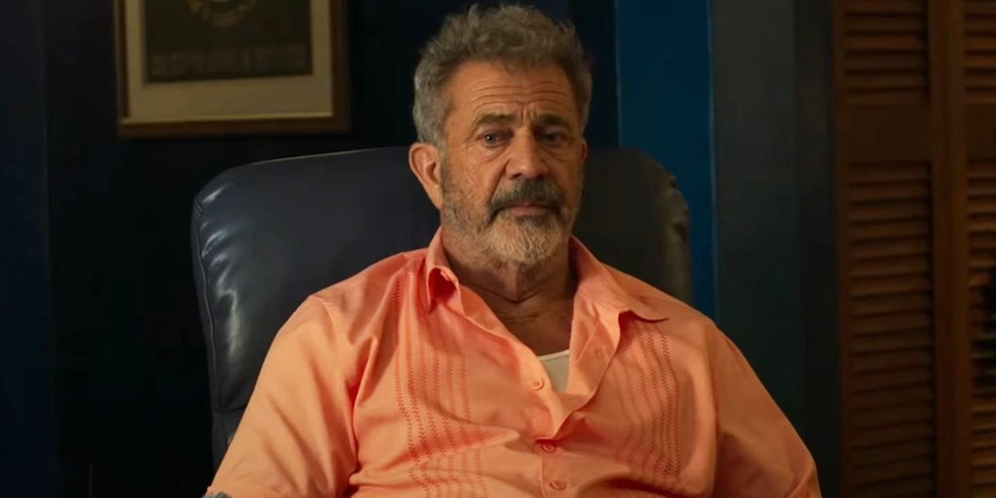Mel Gibson sitting in a chair in Force of Nature