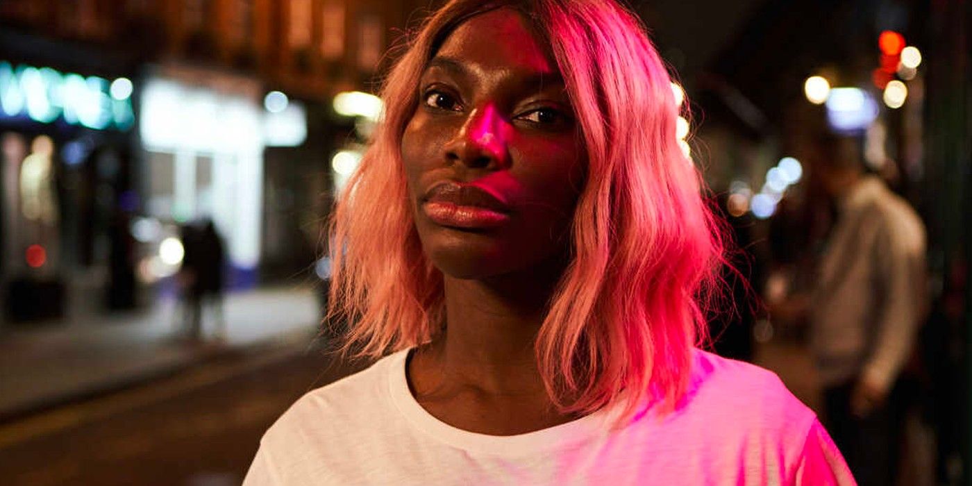 Michaela Coel walks down the street at night in I May Destroy You