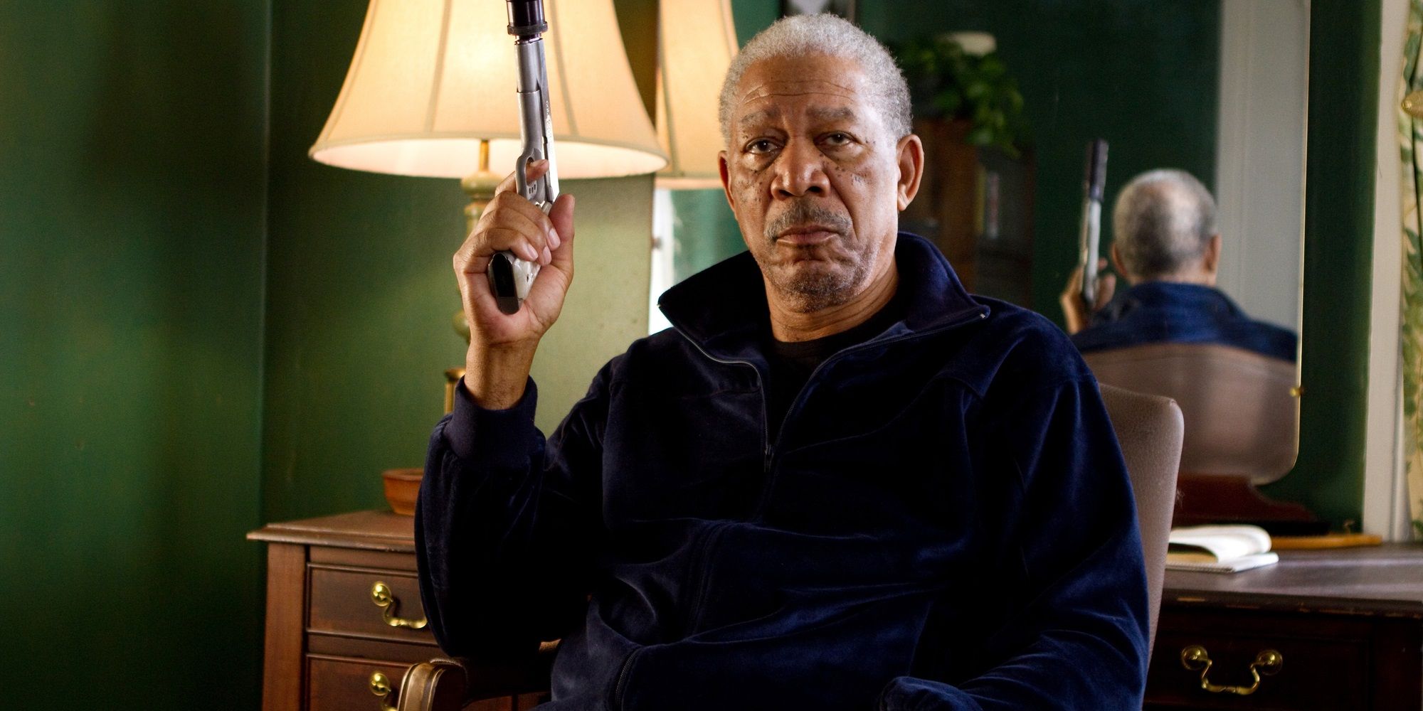 Morgan Freeman with a pistol in Red