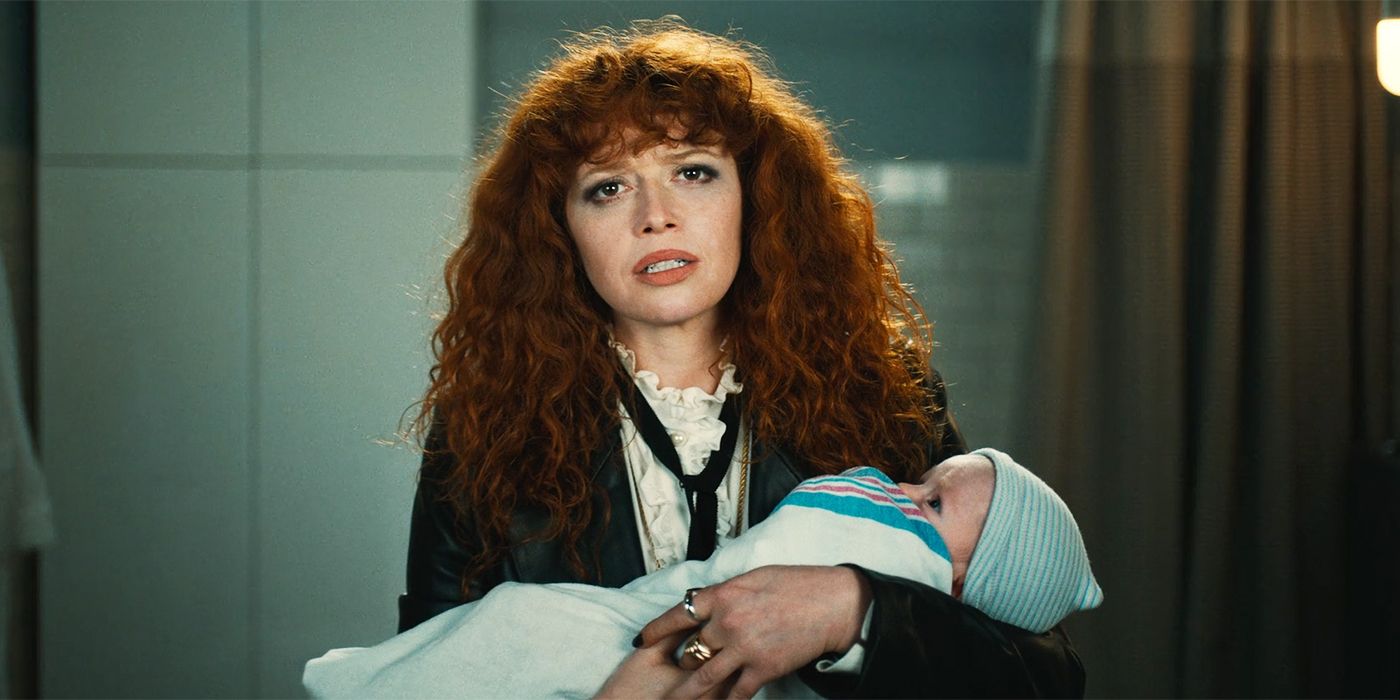 Natasha Lyonne as Nadia in Russian Doll season 2, episode 6 holding a baby