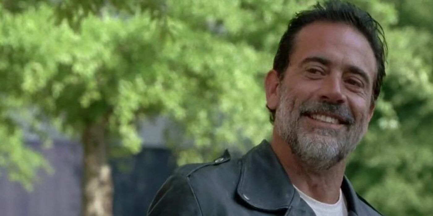Negan smiling at someone in Walking Dead