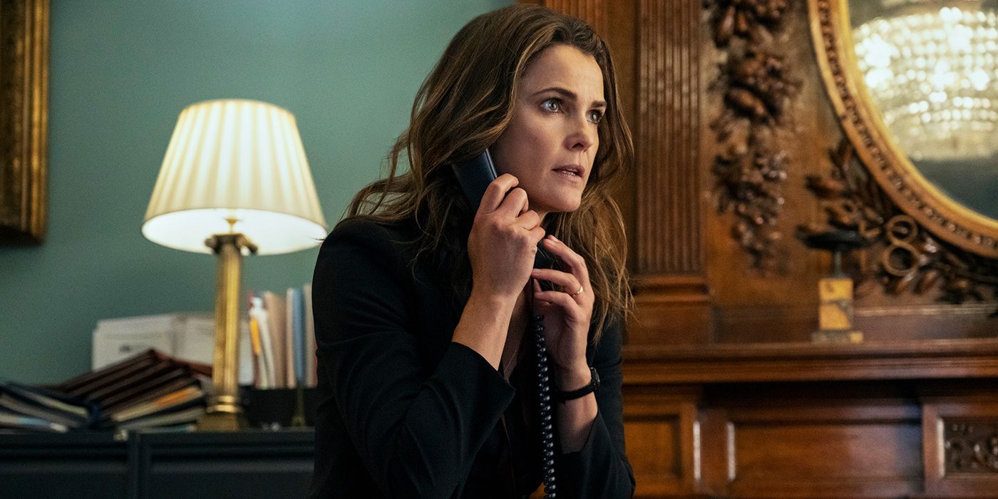 Kate (Keri Russell) holding a phone in Netflix's The Diplomat.