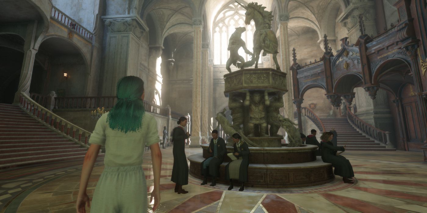 A female student with green hair standing in the Central hall wearing pajamas in Hogwarts Legacy.