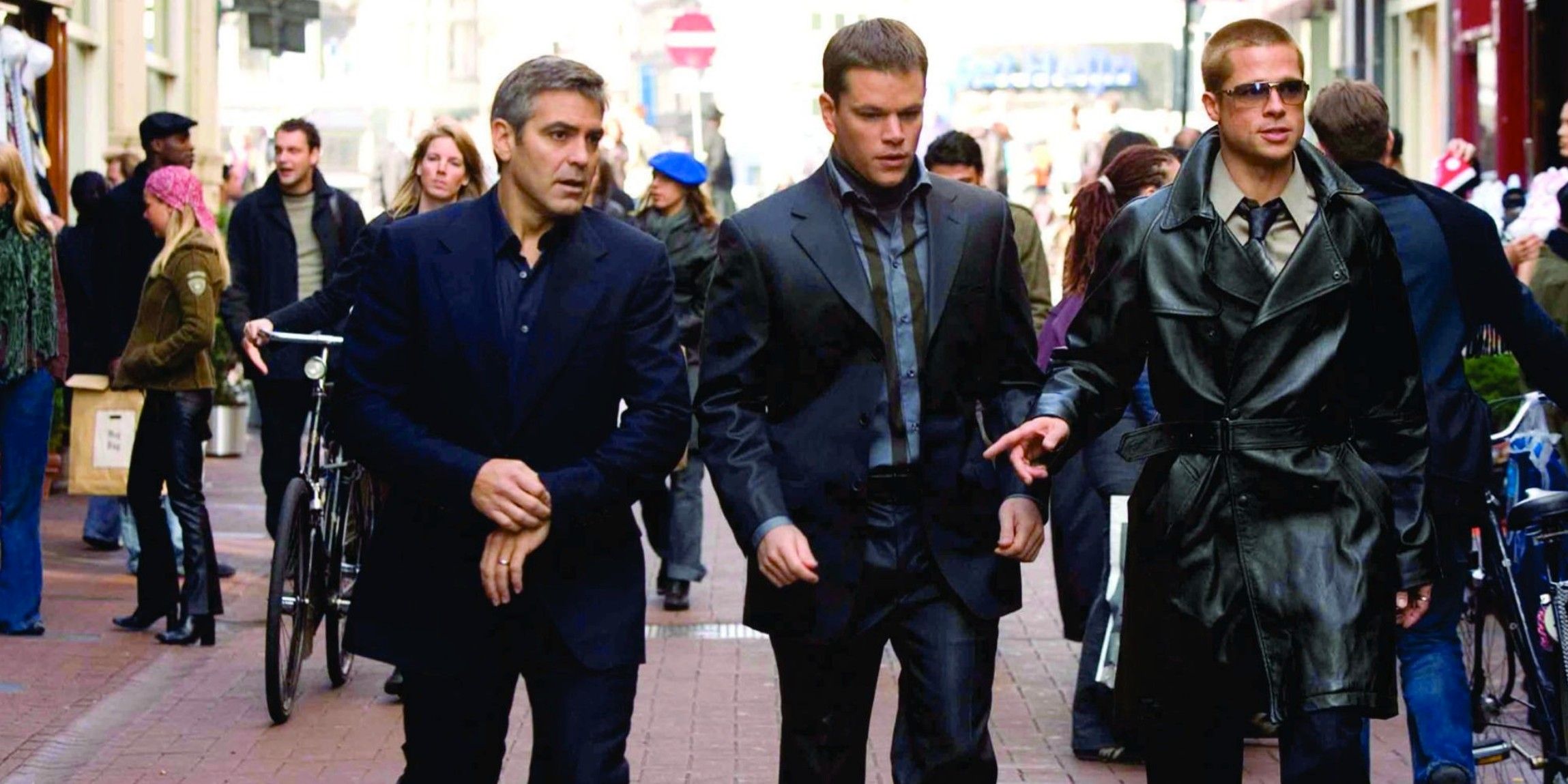 George Clooney, Brad Pitt, and Matt Damon walk together in Ocean's 12