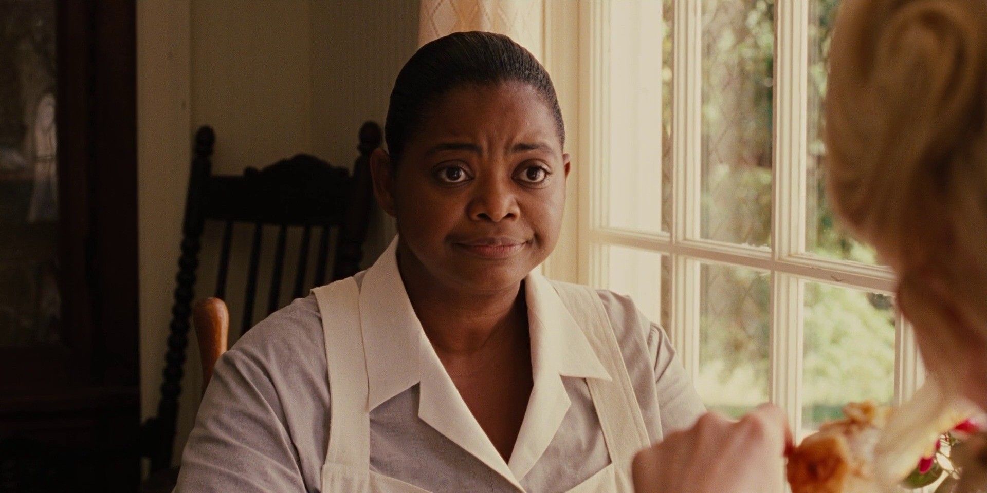Octavia Spencer looking serious in The Help